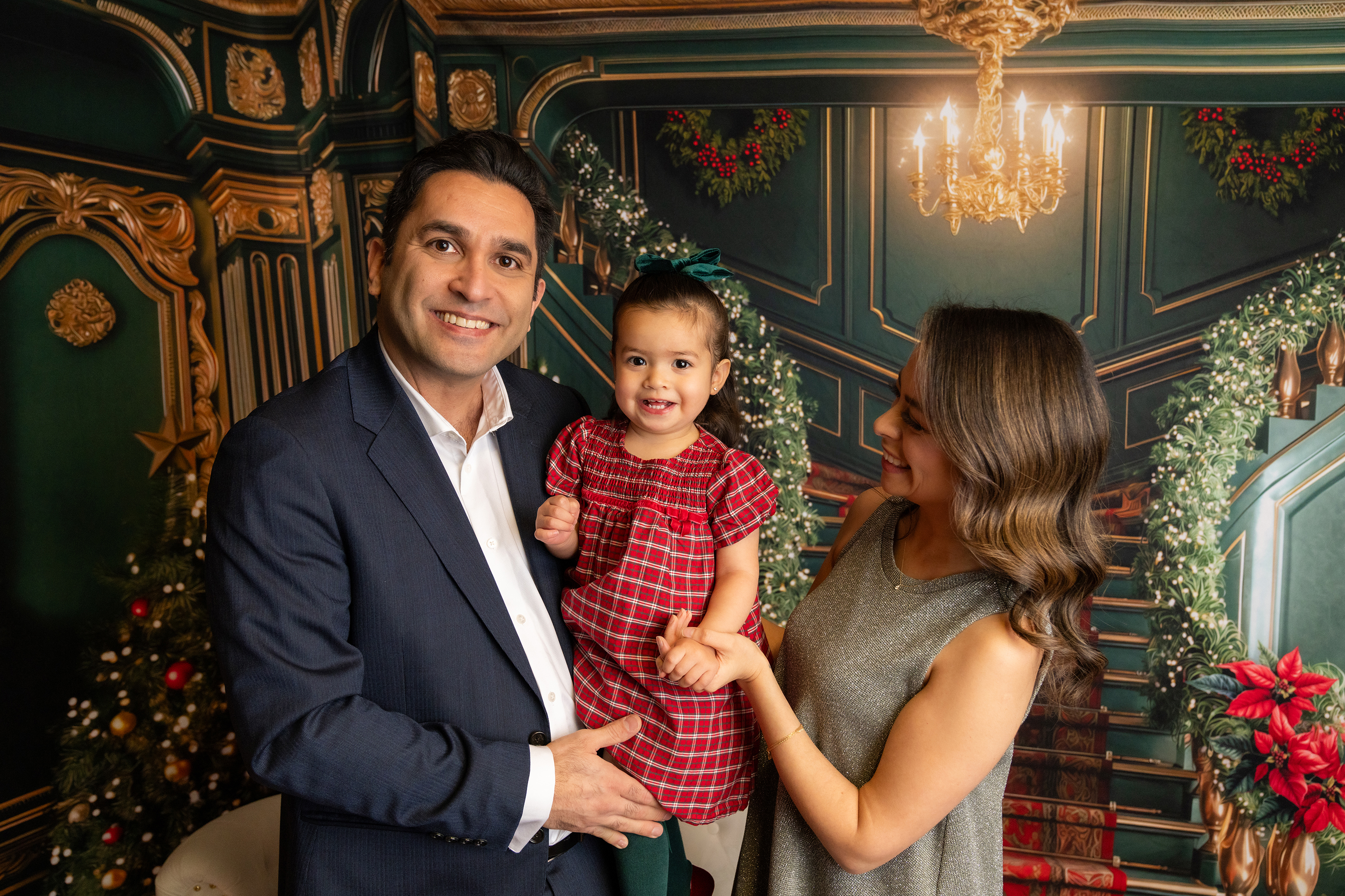 Natalia and Ali Khosravani with their daughter