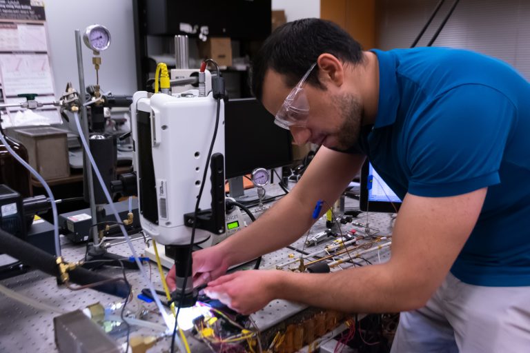 Daniel Lorenzini prepares to test a microchip