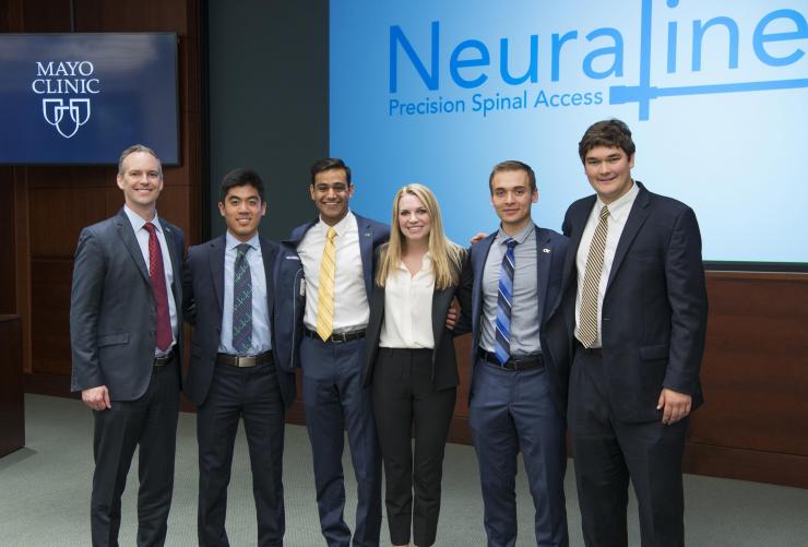 Team Neuraline and Dr. Rains: Pictured are (left to right), Professor of the Practice James Rains, and Capstone students Cassidy Wang, Dev Mandavia, Marci Medford, Lucas Muller, and Alex Bills. 
