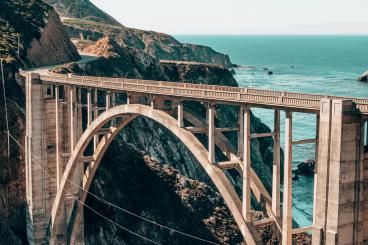 aerial photo of a bridge over a gorge