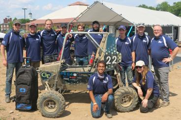 GT Off Road group photo around their 2021 competition vehicle.