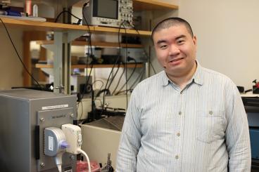 Chengzhi Shi in his lab