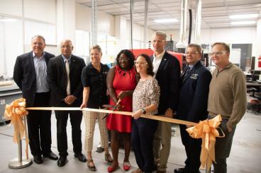 Partners of the facility gathered for an official ribbon cutting ceremony