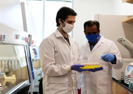 Professor Ankur Singh (right) with graduate student Chris Carlson, second author of the Nature Materials paper.
